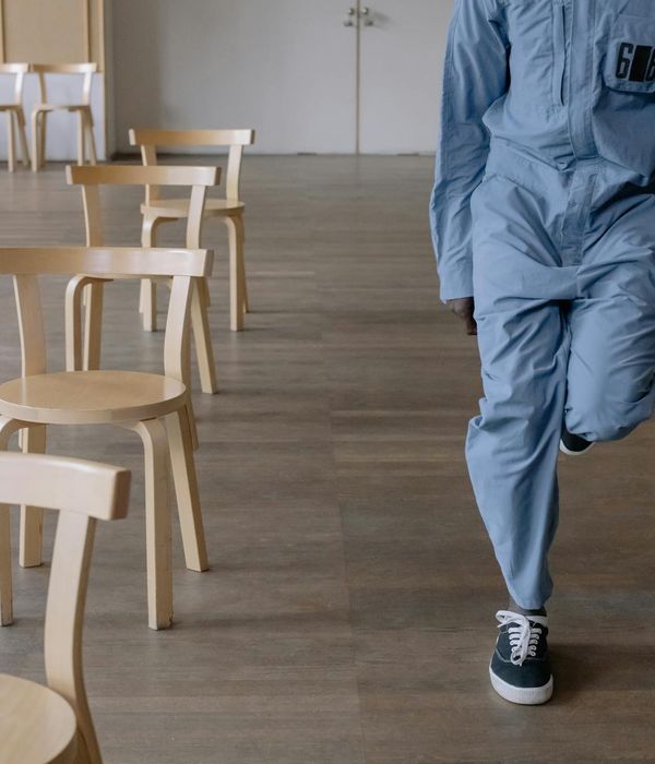 Person doing dynamic morning movement in a modern room